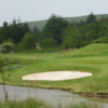 A view over the water of the 11th green at Eastwood Golf Club