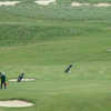 Harris GC: Golfers on the 4th green