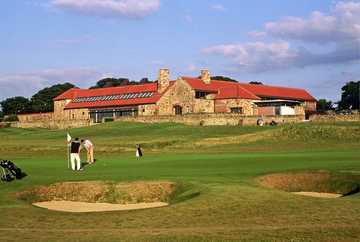 Craigielaw Golf Club's large, stone clubhouse overlooks the golf course and ninth green. (B. Tucker)