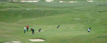 Harris GC: Golfers on the 4th green